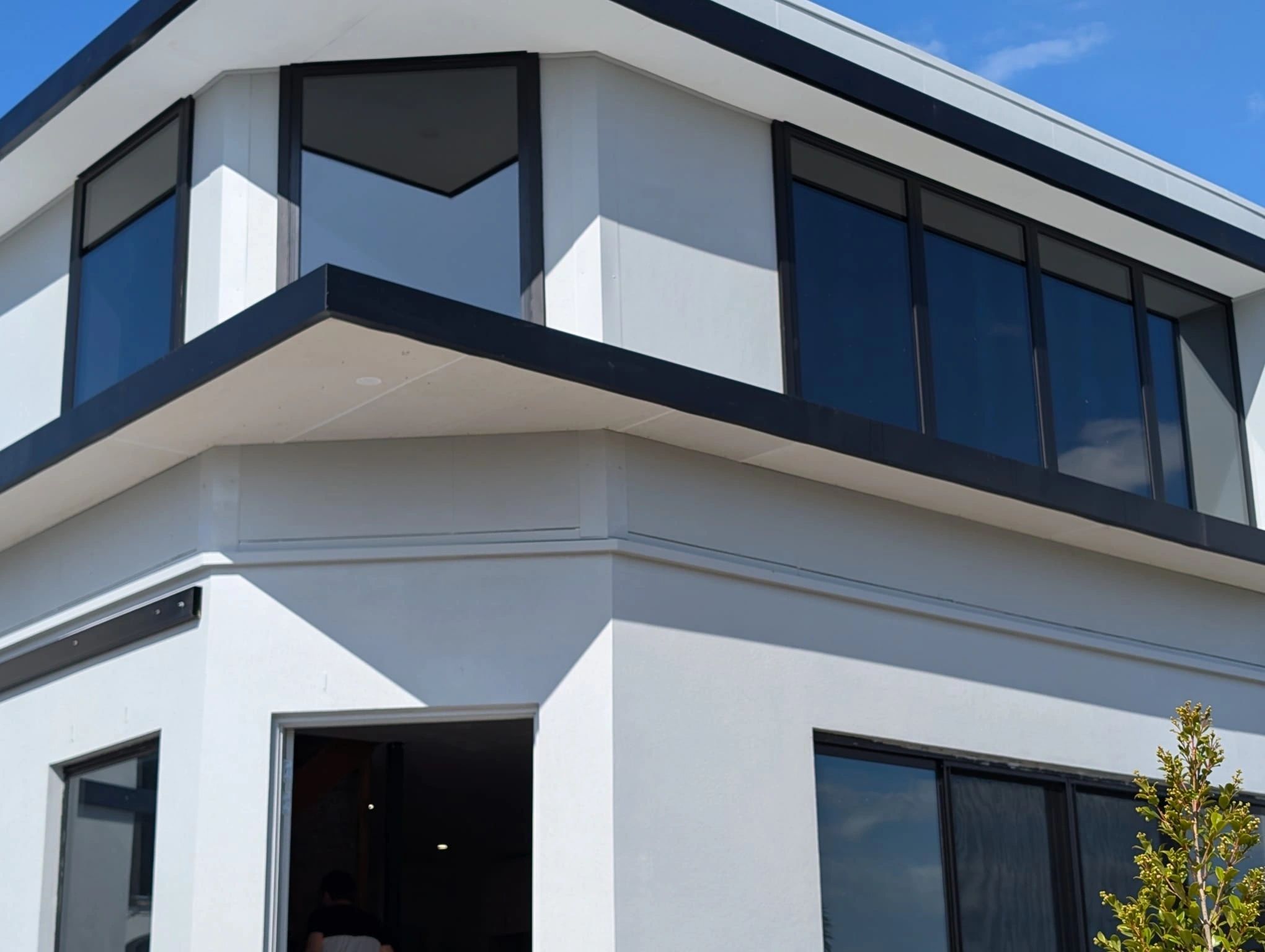 Residential tinted corner windows from Thunder's project gallery